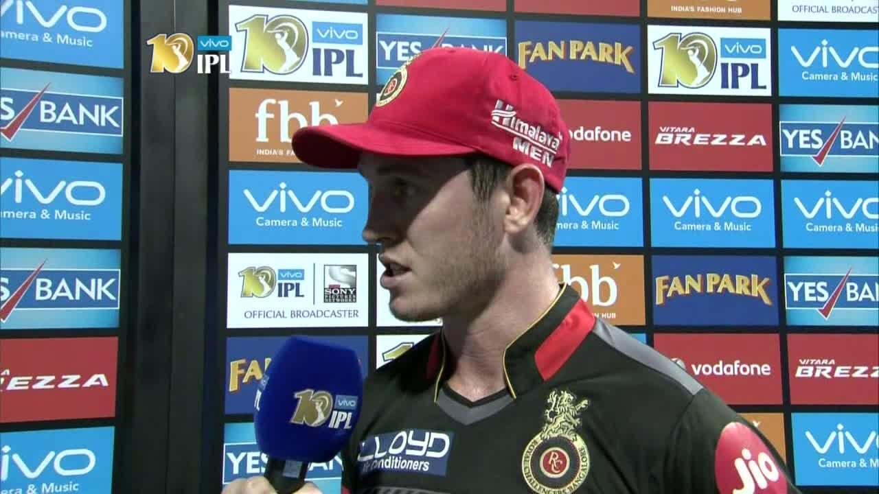 M17: RCB vs RPS – Adam Milne Interview background
