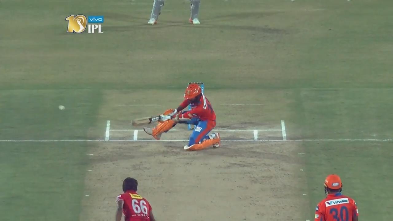 Another one out of Karthik's bag of trick shots background