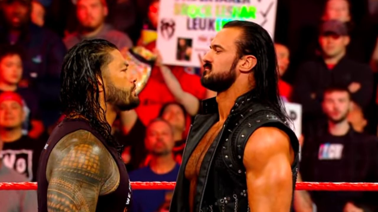 Roman Reigns clashes with Drew McIntyre - This Sunday at WrestleMania background