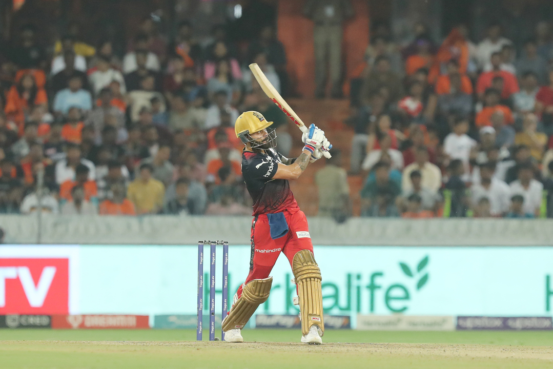 THUMPED: Virat Kohli smacks a gigantic 103M SIX background