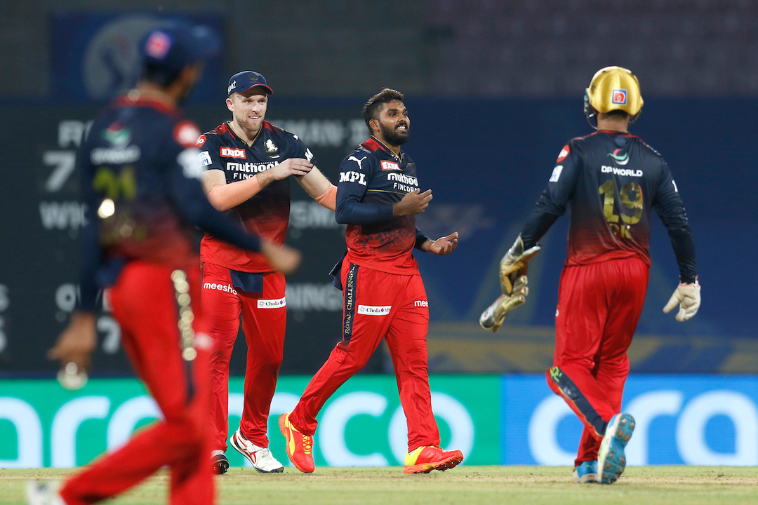 First match, first over, first ball, first wicket - Hello Hasaranga background