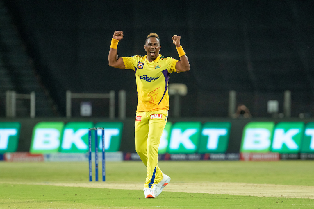 Dwayne Bravo's economical spell of 3/23 background