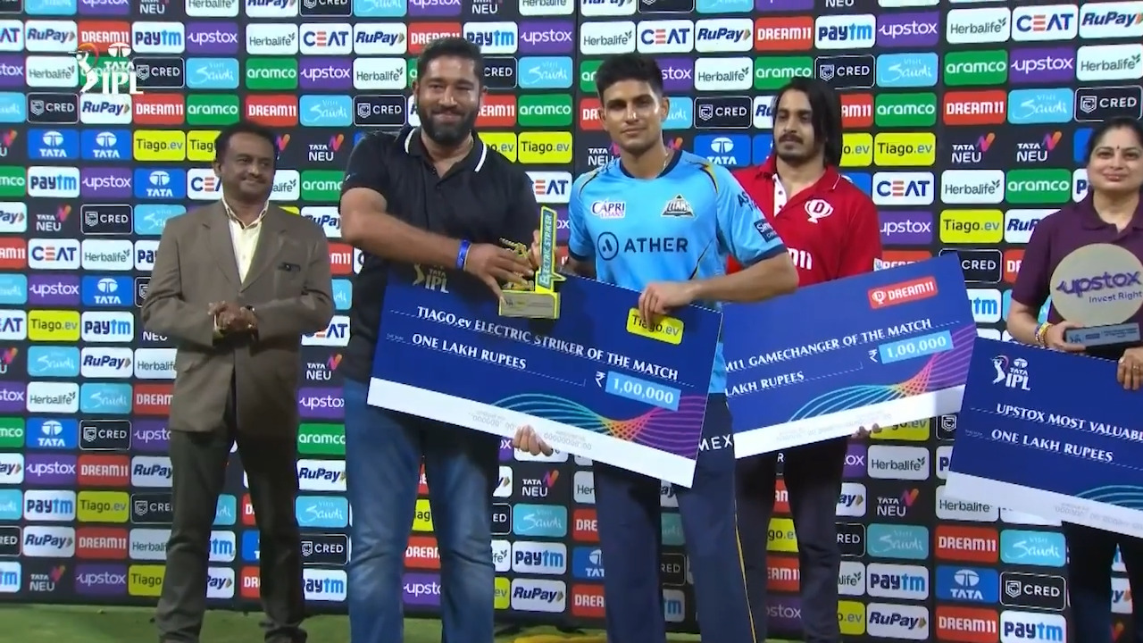 M70: RCB vs GT – TIAGO.ev Electric Striker of the Match – Shubman Gill background