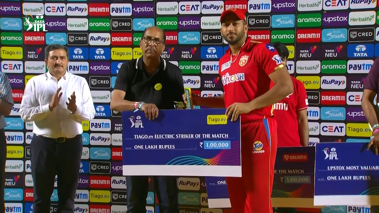 M66: PBKS vs RR – TIAGO.ev Electric Striker of the Match – Shahrukh Khan background