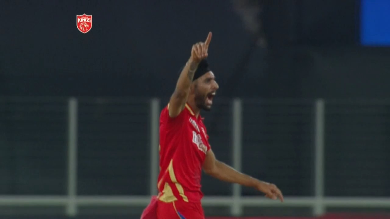 Harpreet's twin strikes - Virat + Maxwell background