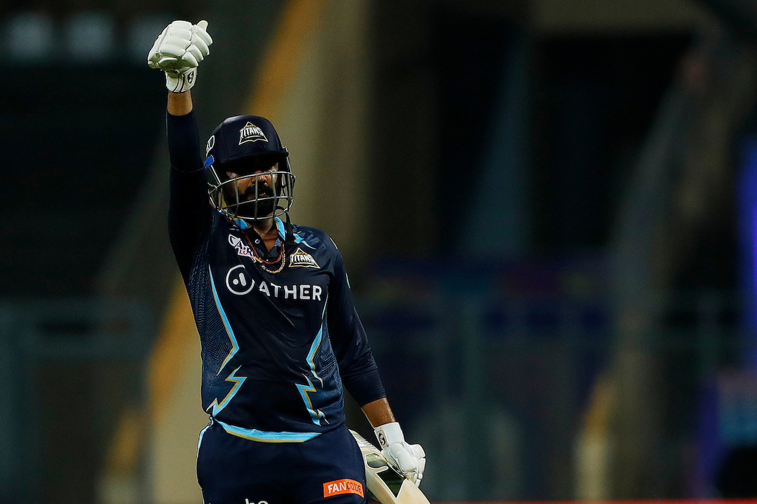 Titan Tewatia powers Gujarat to thrilling win background