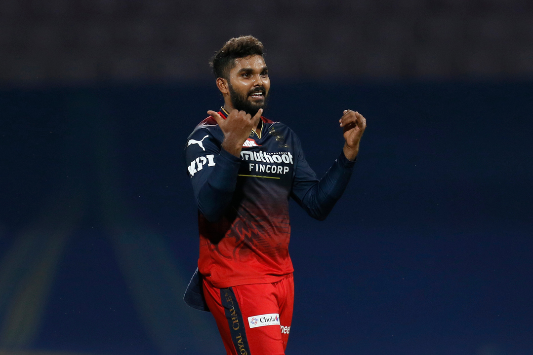 Wanindu Hasaranga's magical spell of 4/20 background