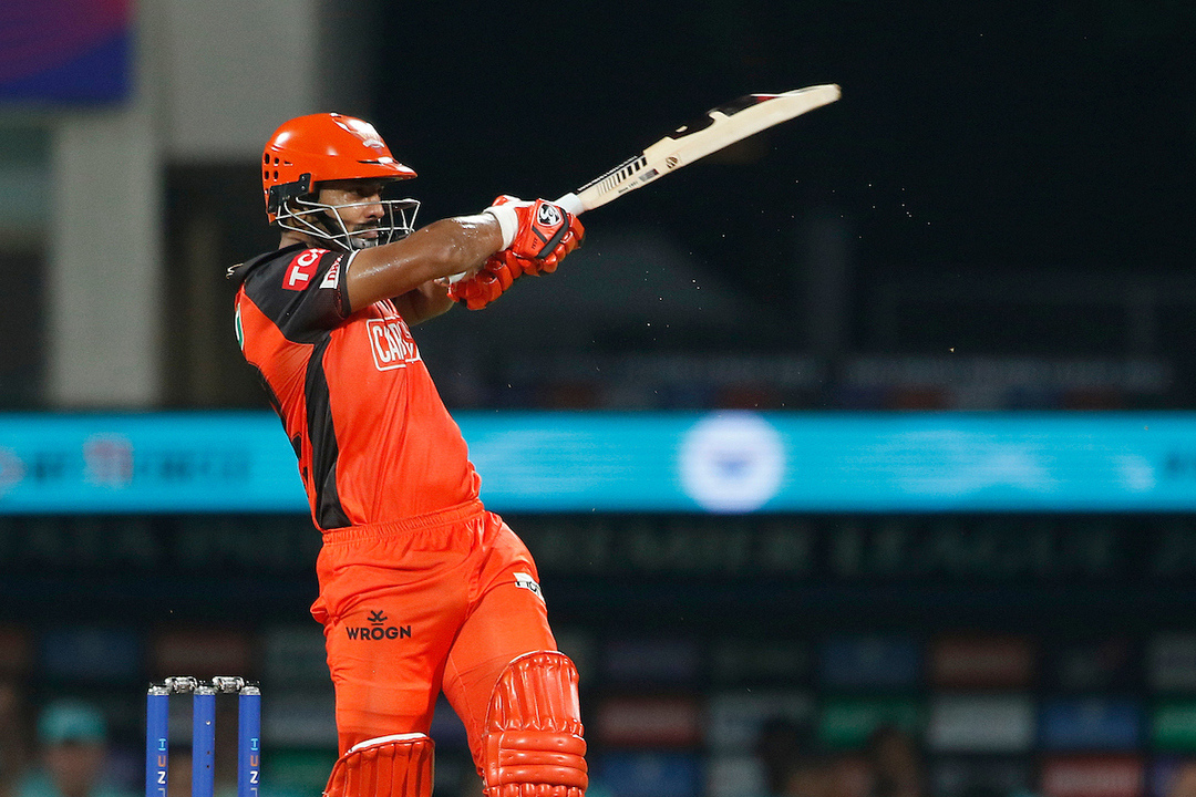 Rahul Tripathi smashes three boundaries in one Tye over background