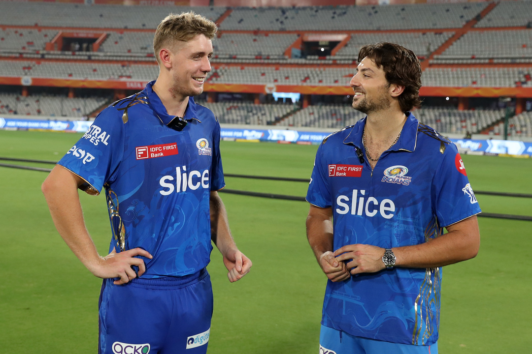 Celebrating MI's winning run with school-mates Cameron Green & Tim David