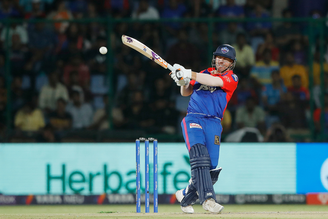 Warner leads from the front with 57(41) background