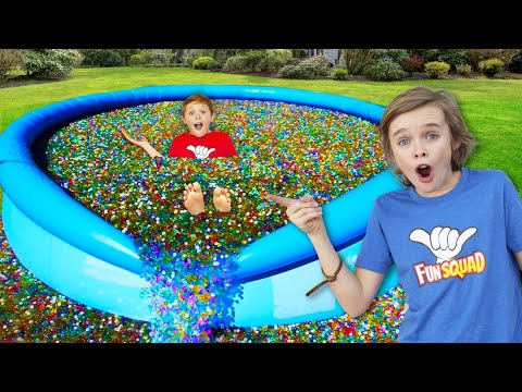 10 Million Orbeez In Our Backyard Pool! background