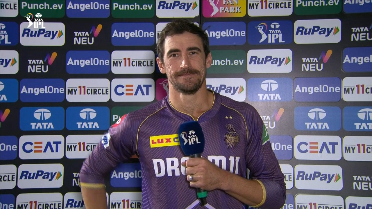 M60: KKR vs MI – Mitchell Starc Interview background