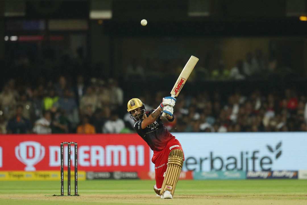 TONKED: Kohli smashes a flat six off Archer background
