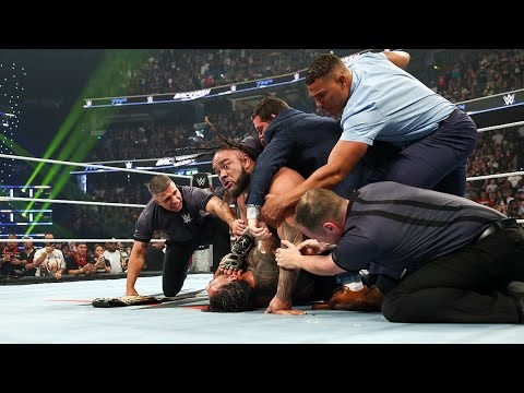 Roman Reigns hospitalized after Jacob Fatu brutal ambush on raw; the Tribal Chief's first words background