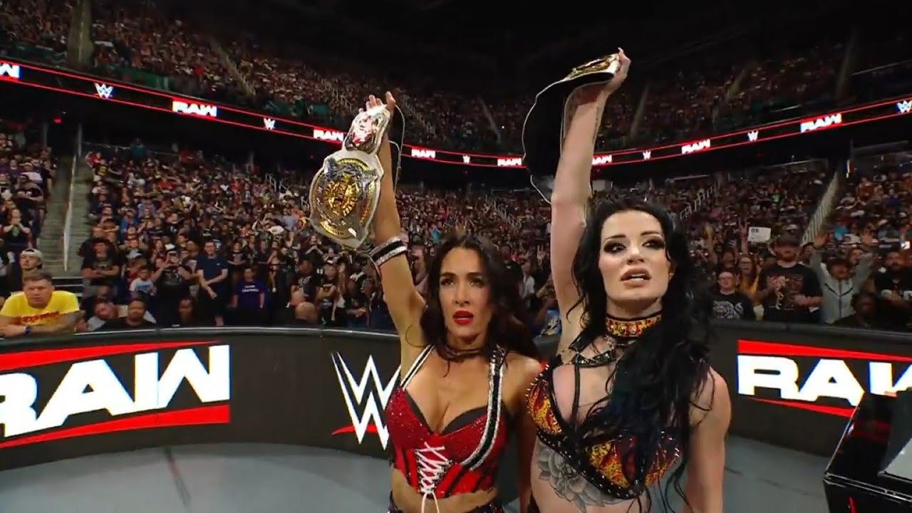 Paige and brie Bella screwed! Liv Morgan cost them WWE tittles on Raw!! Judgment day