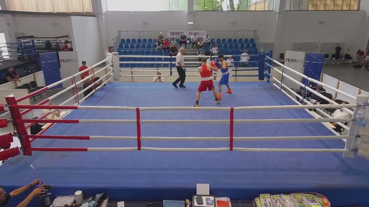 Alen Rustemovski (MKD) vs. Tine Jakomini (SLO) Grand Prix Zagreb 2026 SF's (60kg) background