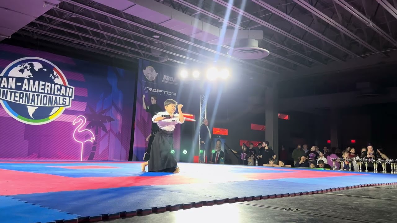 Thomas Maglitto 13 & Under Boys Weapons Overall Grand Championship background