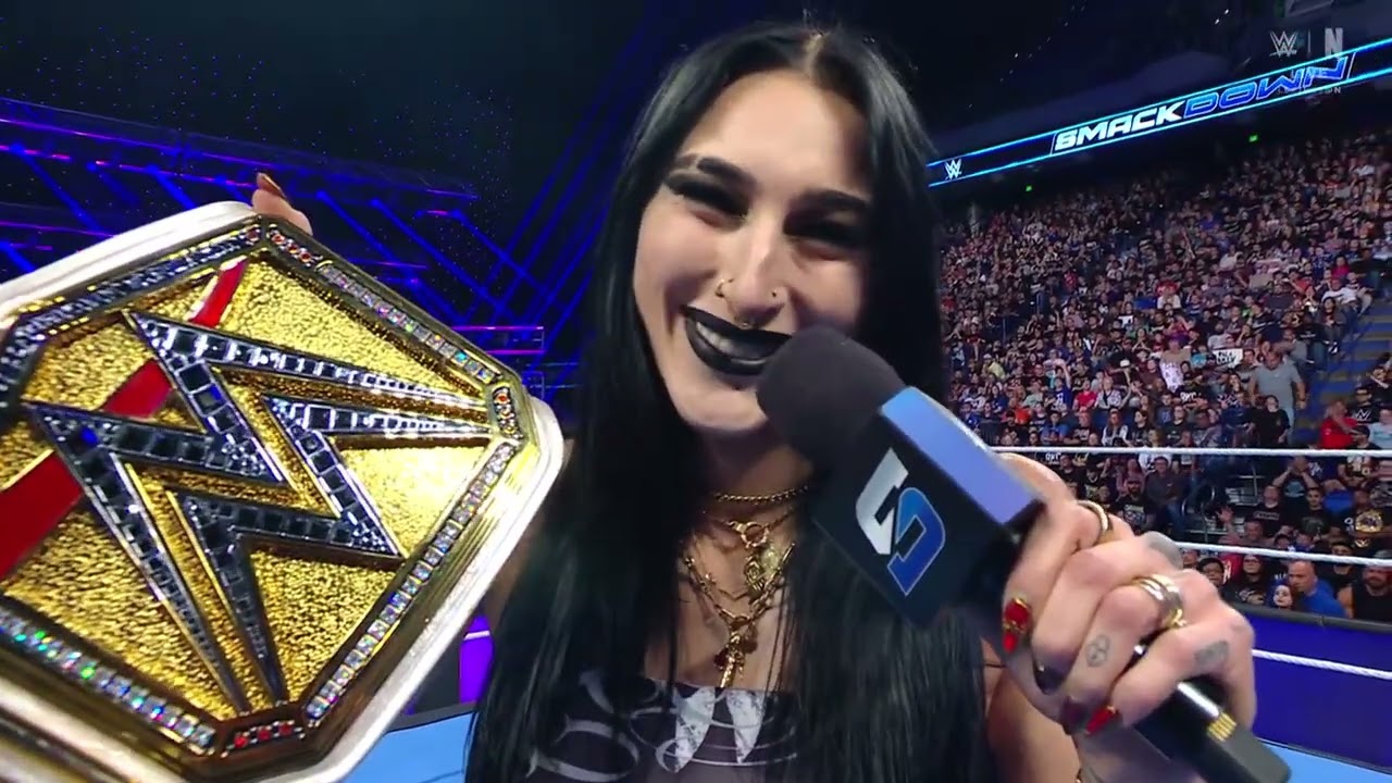 Fatal Influence Interrupt Rhea Ripley, Charlotte Flair & Alexa Bliss background