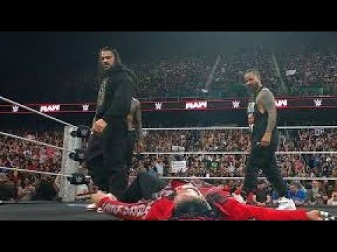 THE USOS TIED JACOB FATU TO THE ROPES — AND ROMAN REIGNS BEAT HIM background