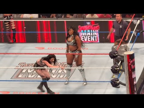 Brie Bella & Paige vs Nia Jax & Lash Legend - WWE SNME 5/23/2026 background