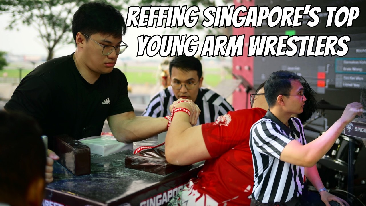 Refereeing at the Singapore Armwrestling Youth Championships