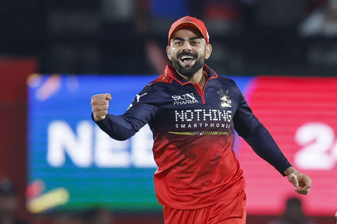 Max Commitment Level: Virat Kohli's spectacular fielding effort background