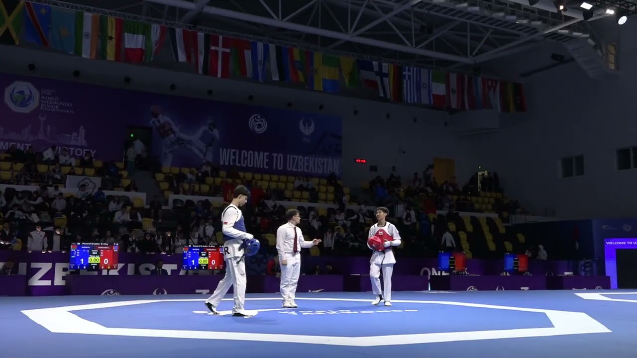 324 Round of 32 M 68kg BLR ALIYEU B MGL NOROLMAA L PGM background