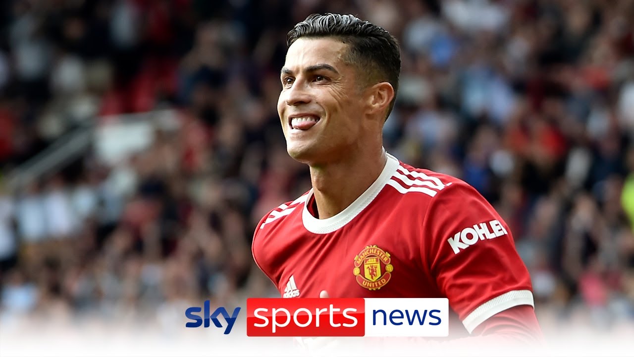 Reaction after Cristiano Ronaldo scores twice on his Manchester United return background