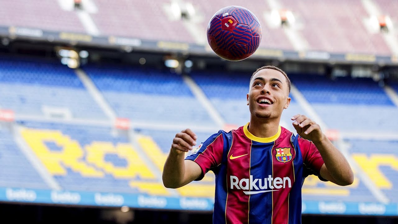 Dest, A Bit Nervous, While He Shows Off Skills at Camp Nou background