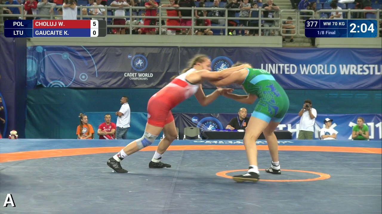 1/8 WW - 70 kg: W. CHOLUJ (POL) df. K. GAUCAITE (LTU) by VPO, 7-0