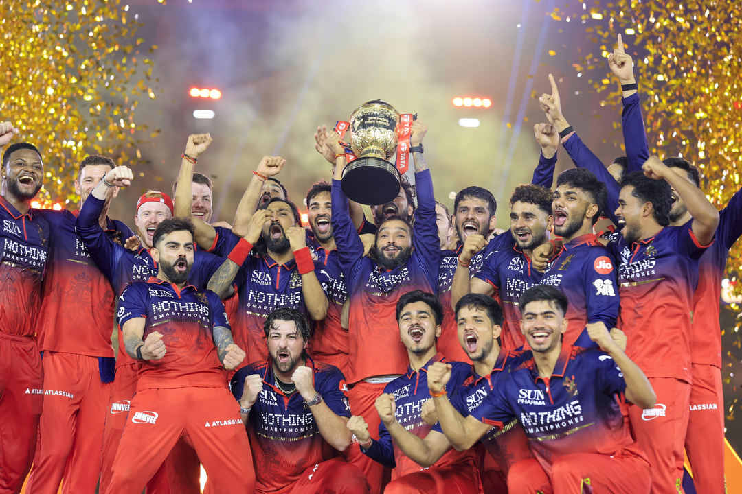 Joy and Emotions of Champions: RCB's Crowning Glory Moment background