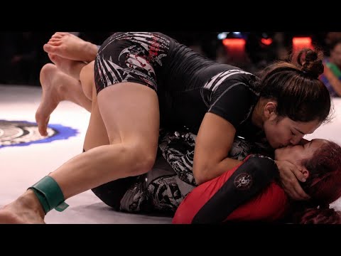 Girl vs Girl Grappling Battle – Who Dominates the Mat? background