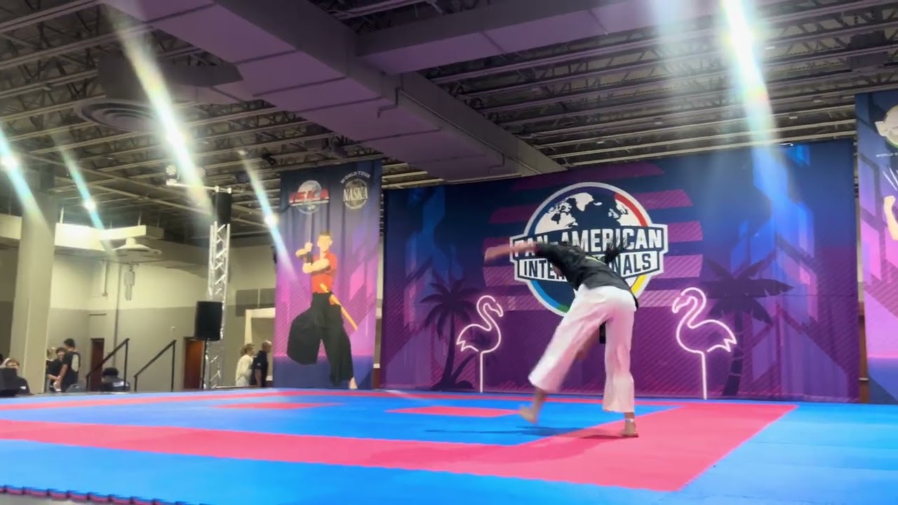 Demi Rodriguez 14-17 Girls CMX Forms Grand Championship - Pan American Internationals 2026 background