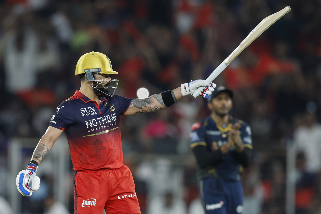 Clutch King: 50 up in some style for Kohli background