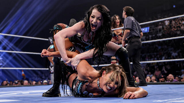Brie Bella & Paige defeat Fatal Influence as Jacy Jayne gets ejected: SmackDown highlights background