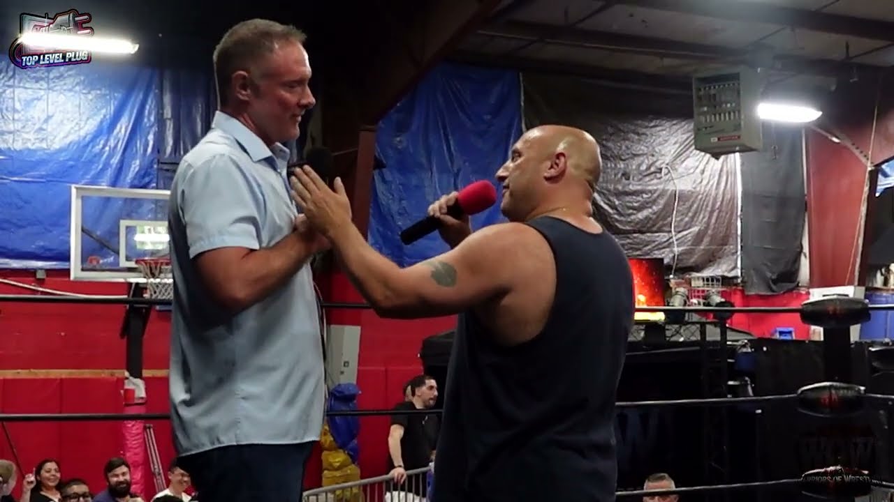 Kent Clay ruins Joe Bellini's plans for the championship at Caged Aggression background