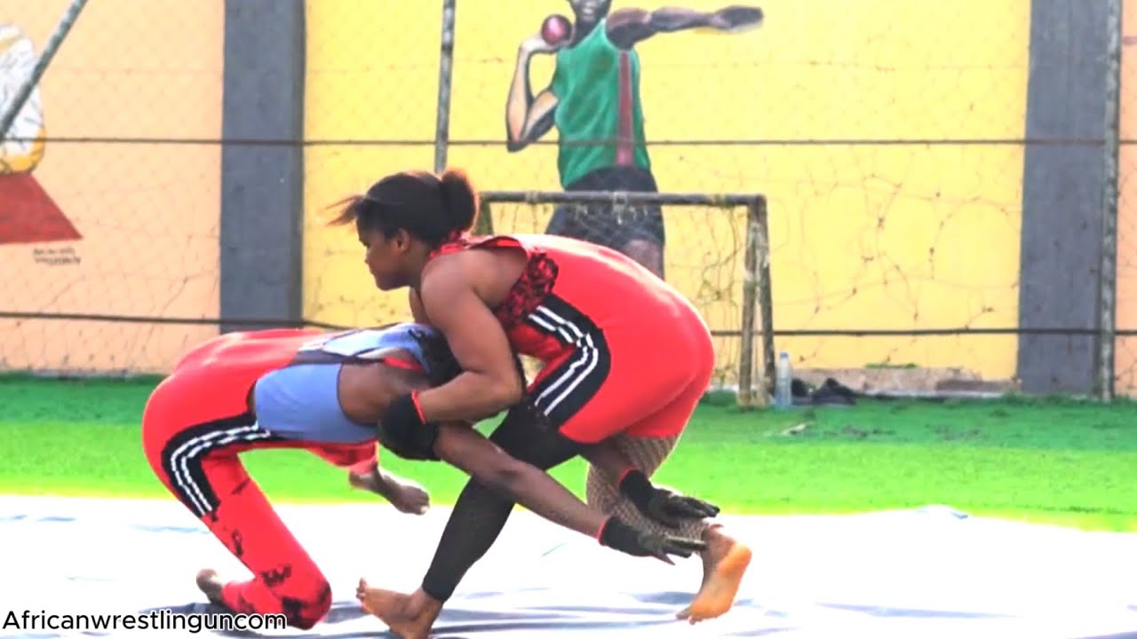 Women wrestling: full of dramatic takedowns background