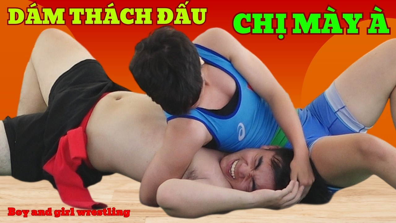 VẬT NAM NỮ, Thân Trà My lại chén một Anh Trai lạ,Women wrestling with men at village festival.