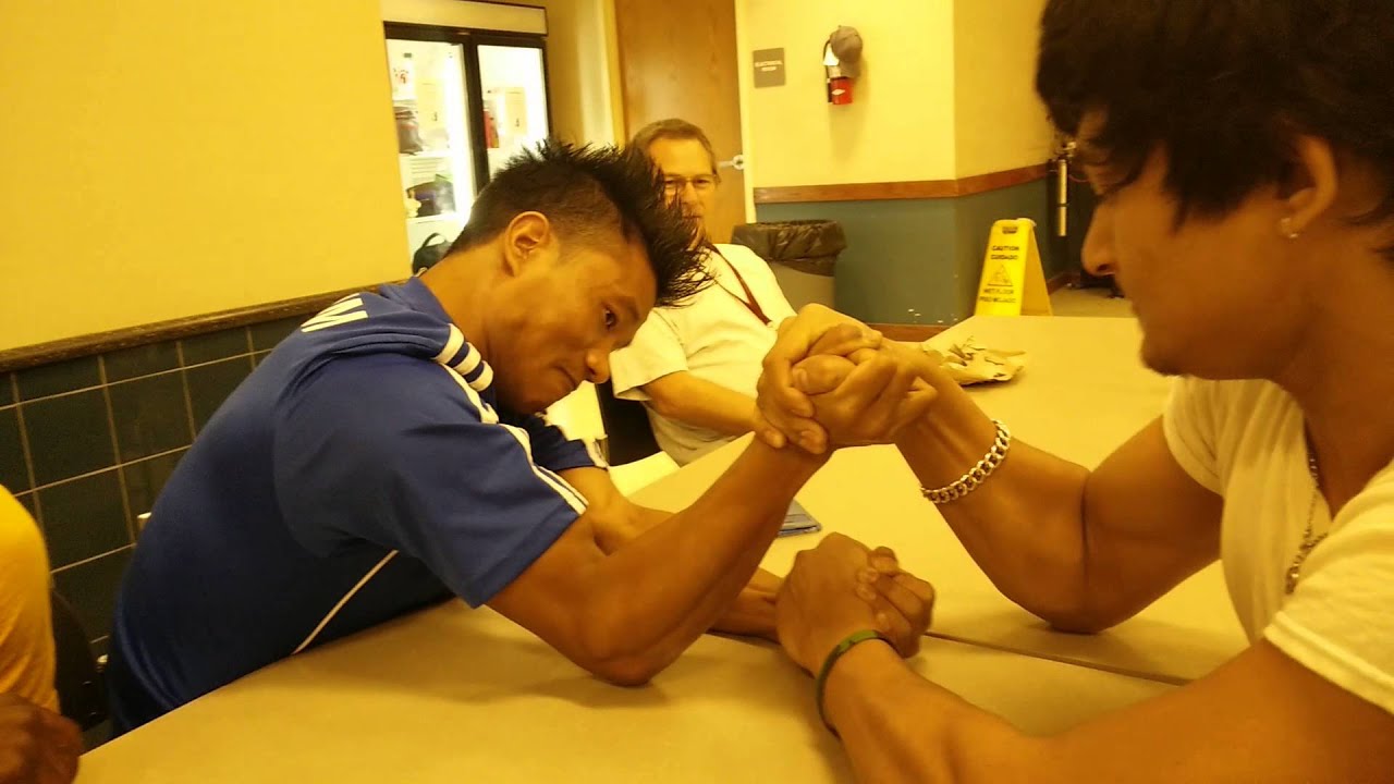 Nepali vs burmis armwrestling!. background