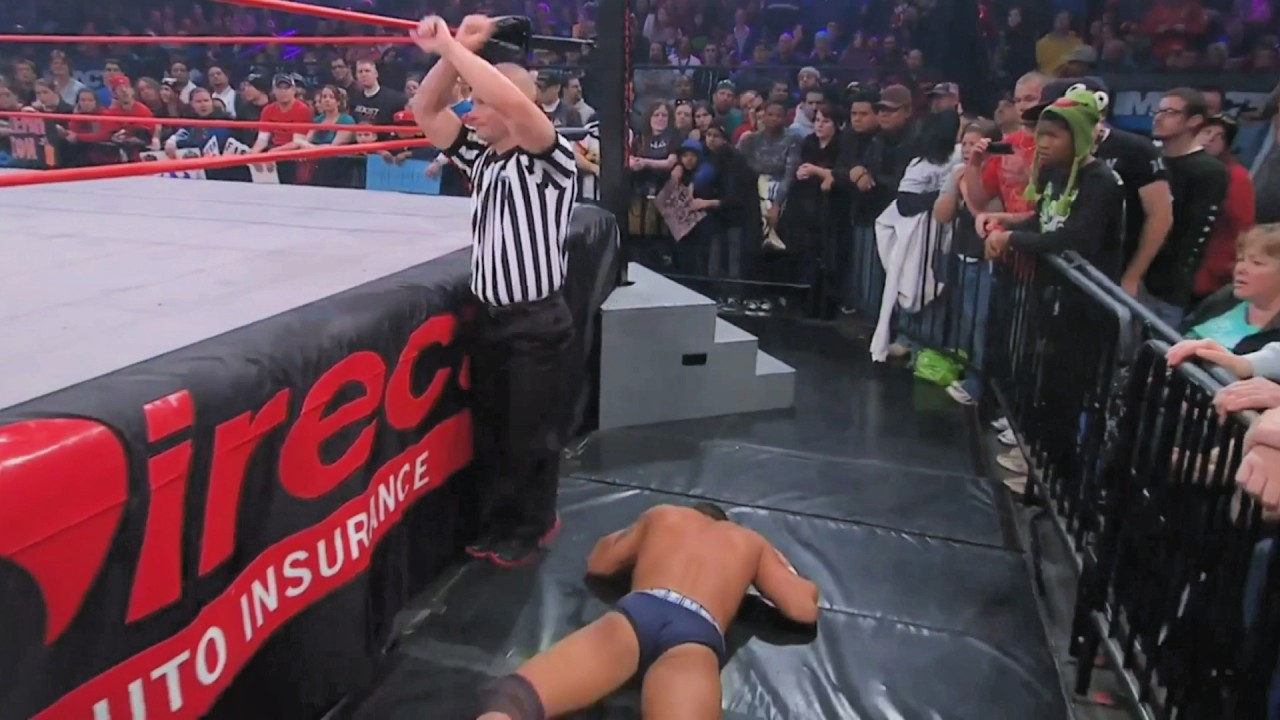 Wrestlers Who Suffered Real Medical Emergencies in the Ring background