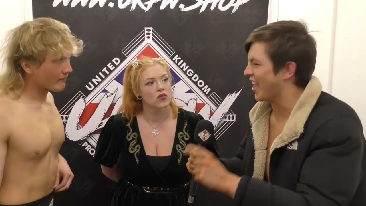 The 114 Arrive In UKPW background