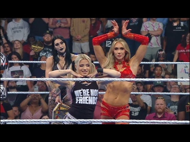 Chalotte flair triggers Alexa bliss! While rhea Ripley vacant the titleSummerSlam changes background
