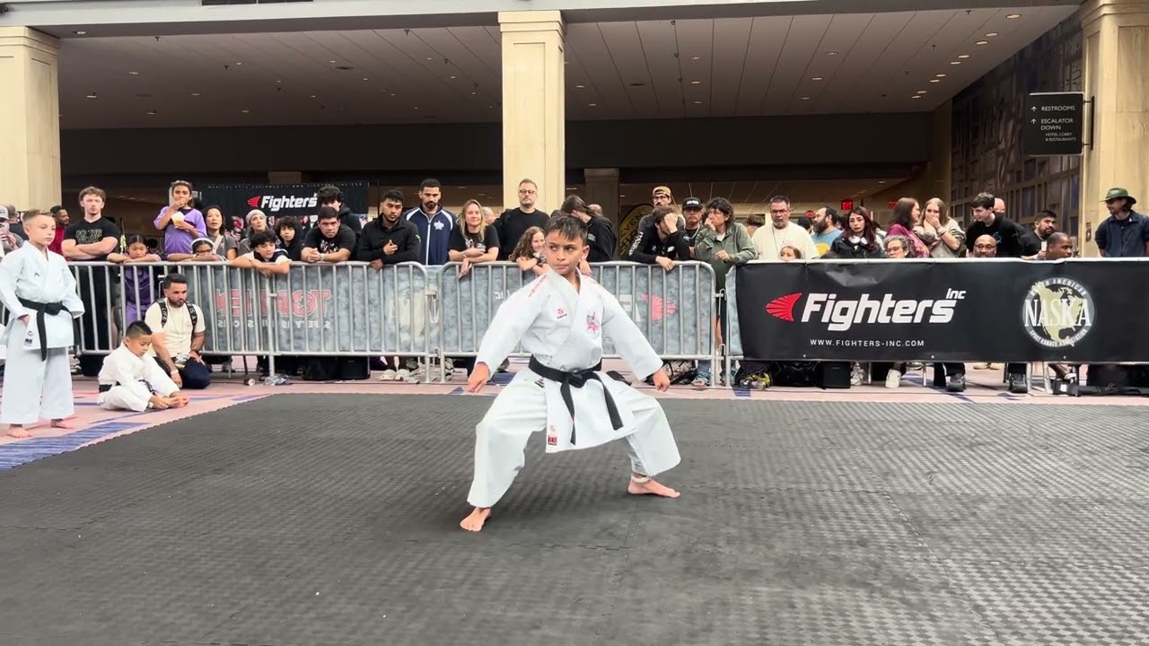 Kaiden Camacho 13 & Under Boys Traditional Forms Grand Championship background