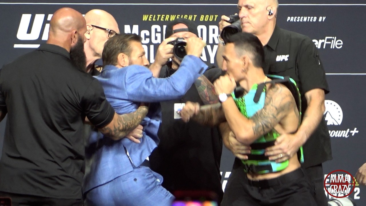 Conor McGregor RIPS OFF Max Holloway GLASSES at Presser FACE OFF for UFC 329 background