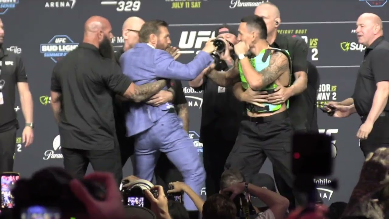 CONOR McGREGOR vs MAX HOLLOWAY FACE-OFFS Get PHYSICAL! 😳 | UFC 329 background