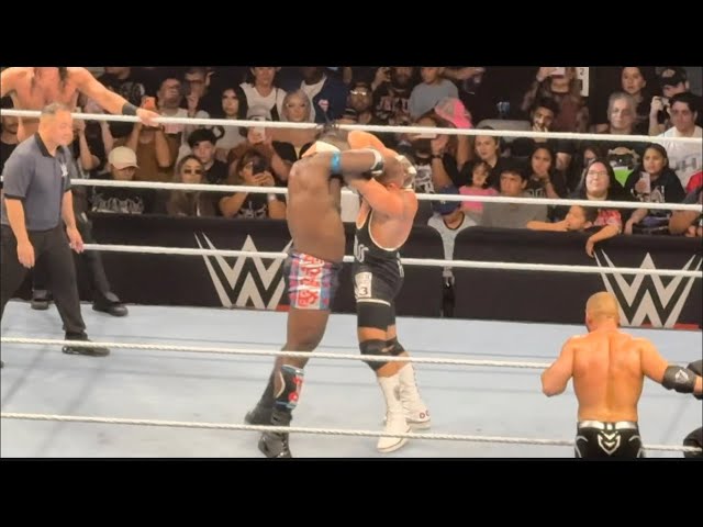 Oba Femi, Seth Rollins vs Bron Breakker & Austin Theory FULL MATCH - WWE Live background