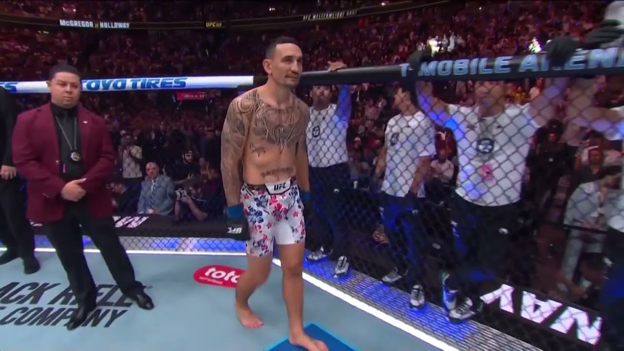 GOOSEBUMPS! Conor McGregor & Max Holloway staredown across the Octagon at #UFC329 background