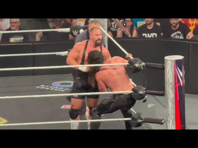 Seth Rollins vs Bron Breakker Full Match background