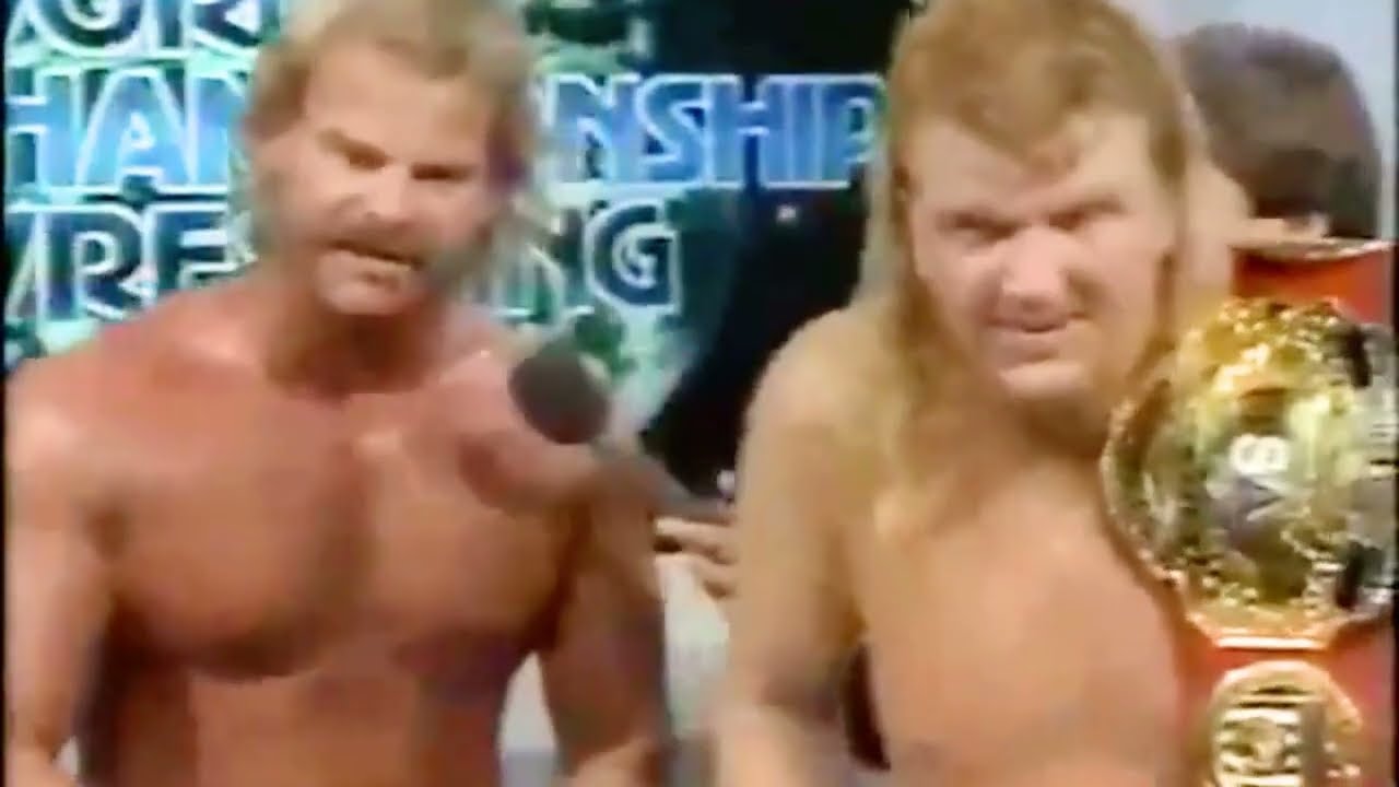 Barry Windham puts The Sleeper on Jim Cornette. NWA 1987 background
