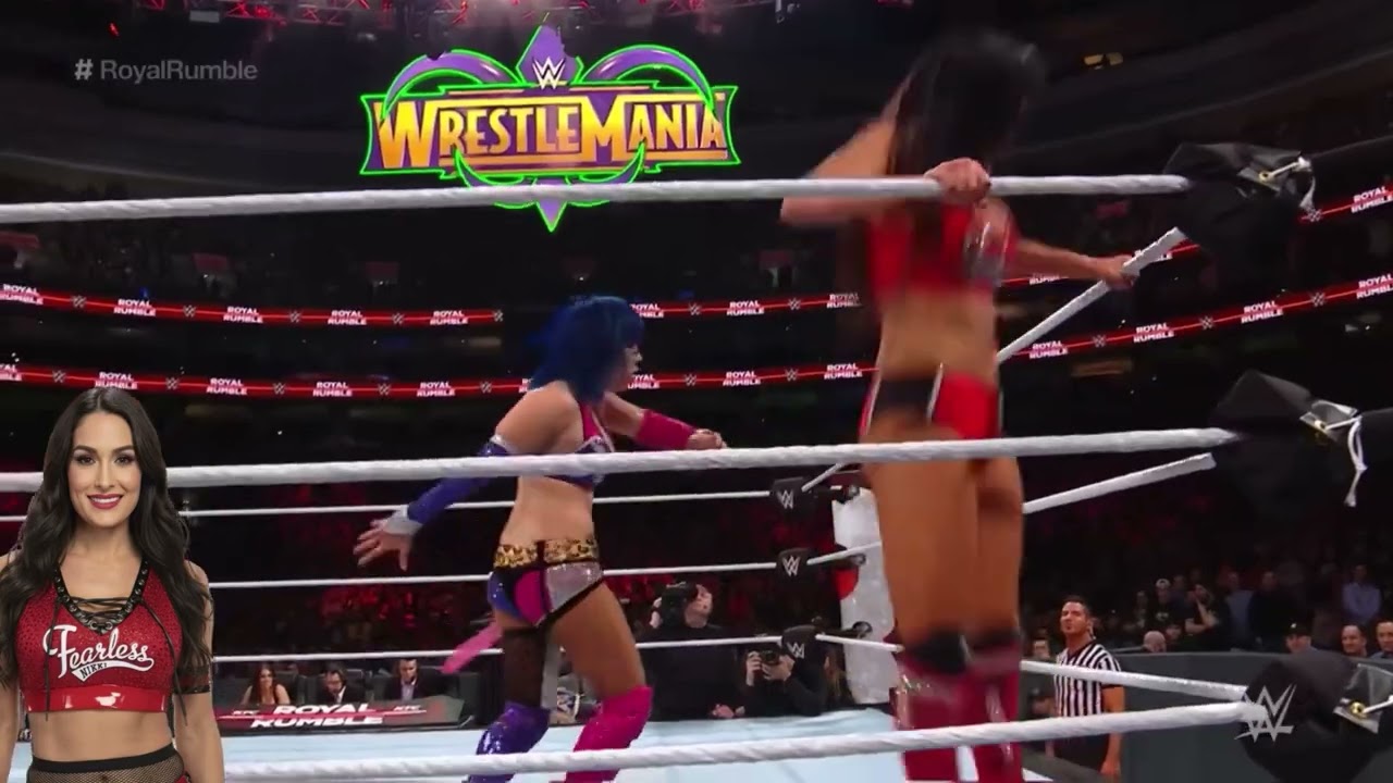 Nikki Bella vs Naomi-Springboard enziguri background